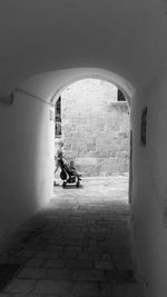 Man sitting in building