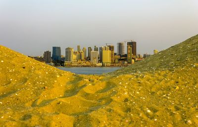 View of cityscape against clear sky