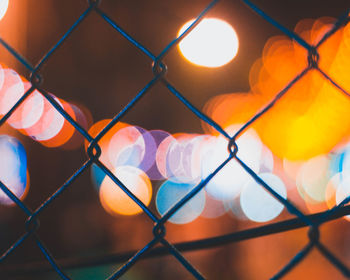 Close-up of orange chainlink fence