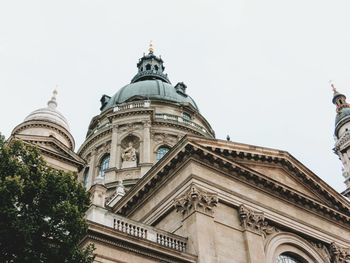 Low angle view of statue of cathedral against sky