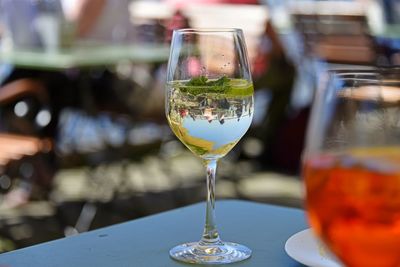 Close-up of wine in glass on table at restaurant