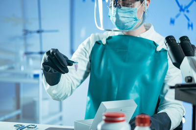 Female scientist experimenting in laboratory