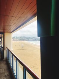 Scenic view of sea seen through window