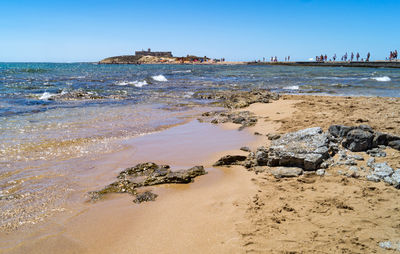 Scenic view of sea against clear sky