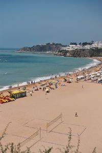 Scenic view of beach against clear sky