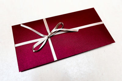 High angle view of red paper in box