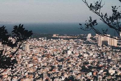Aerial view of cityscape against sky
