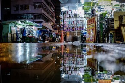 Reflection of illuminated buildings in water