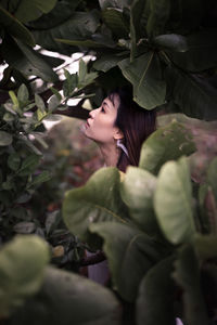 Woman looking at plants