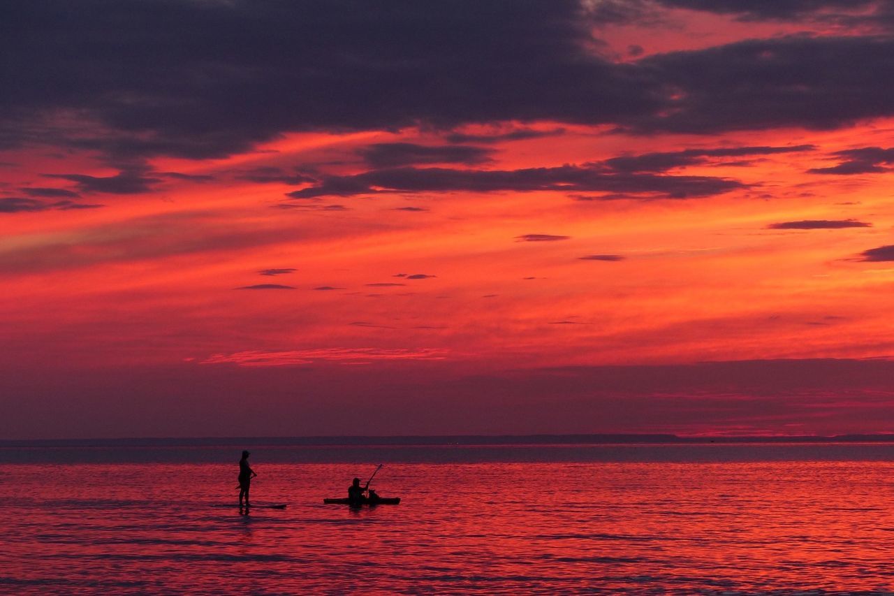 sunset, water, sea, sky, orange color, horizon over water, scenics, beauty in nature, tranquility, tranquil scene, cloud - sky, boat, idyllic, nature, dramatic sky, cloud, cloudy, outdoors, rippled, sun, remote, non-urban scene, ocean