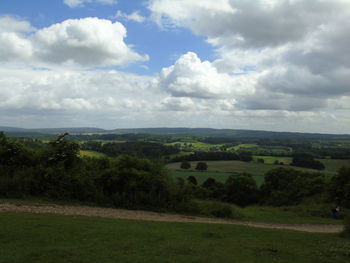 Scenic view of agricultural field against sky