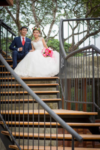 Couple kissing on steps