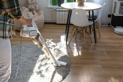 Low section of man working at home