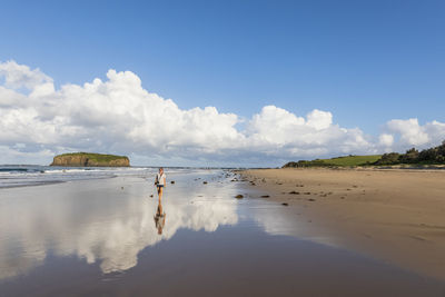 Panoramic view of beach against sky