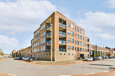 Buildings in city against sky