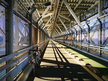 Railroad track with bridge in background