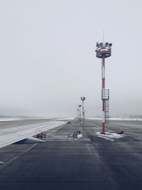 View of airport runway in fog