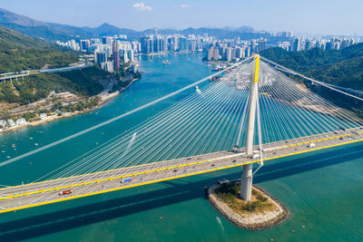 Panoramic view of bridge over sea against sky