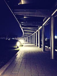 Illuminated railroad station at night