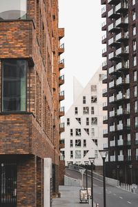 Buildings in city against sky