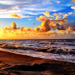 Scenic view of sea at sunset
