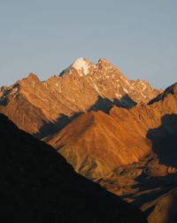 Scenic view of mountains against clear sky