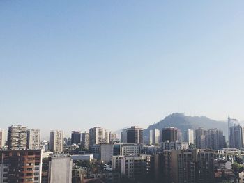 Buildings against clear sky