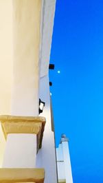 Low angle view of building against blue sky