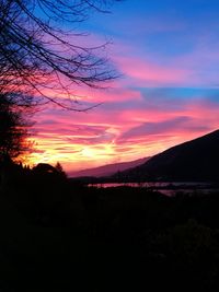 Scenic view of silhouette landscape against sky during sunset