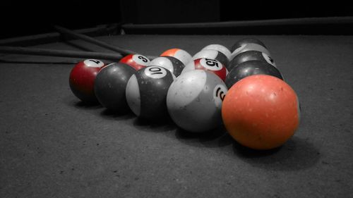 Close-up of multi colored balls on table