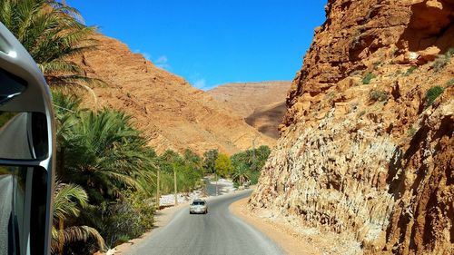 Road leading towards mountain