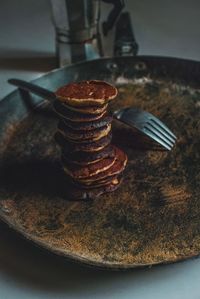 Close-up of pancake with fork in plate