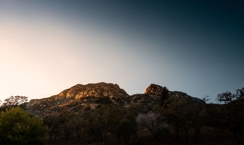 Low angle view of mountain against clear sky