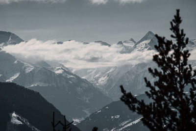 Scenic view of snowcapped mountains against sky