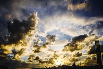 Low angle view of dramatic sky during sunset