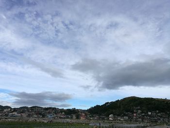 Panoramic view of city against sky