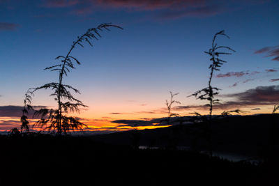 Scenic view of silhouette landscape against sky during sunset