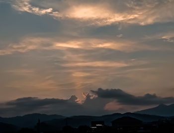 Scenic view of dramatic sky during sunset