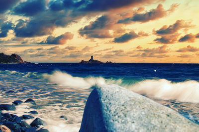 Scenic view of sea against sky during sunset