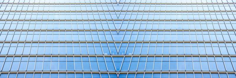 Low angle view of modern building against sky