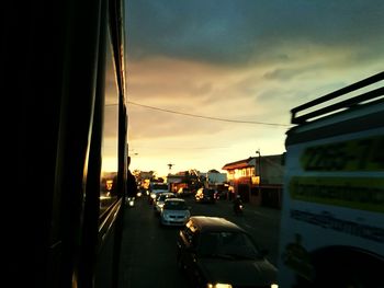 Traffic on road at dusk