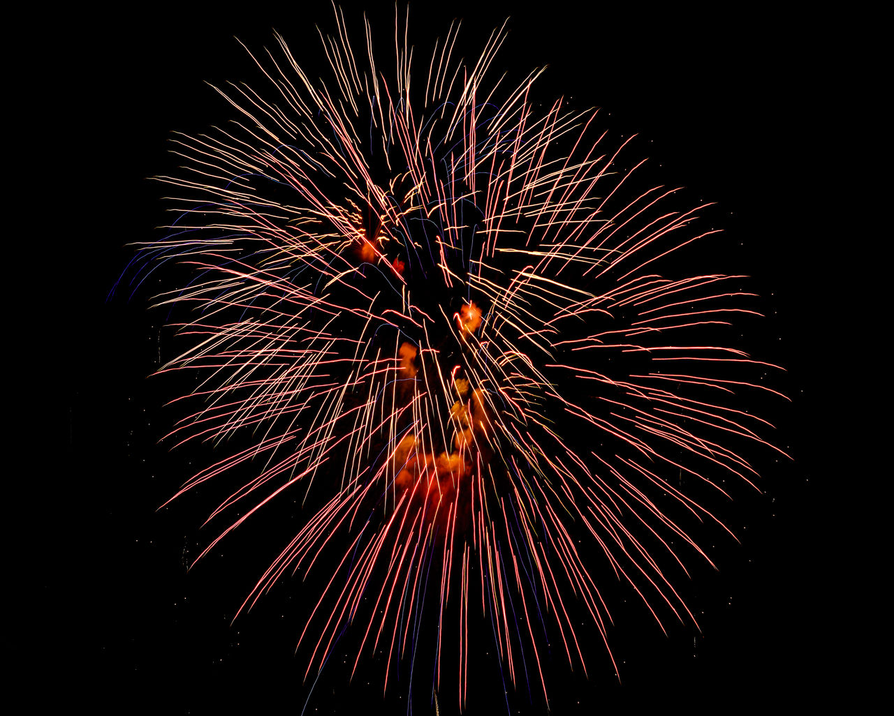 fireworks, night, celebration, motion, event, firework display, exploding, illuminated, arts culture and entertainment, sky, no people, nature, glowing, recreation, low angle view, firework - man made object, long exposure, multi colored, blurred motion, outdoors, dark, black, burning, new year's eve, midnight