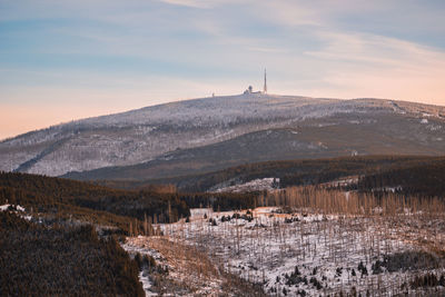 Scenic view of landscape against sky during sunset