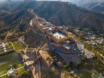 High angle view of fort by mountains