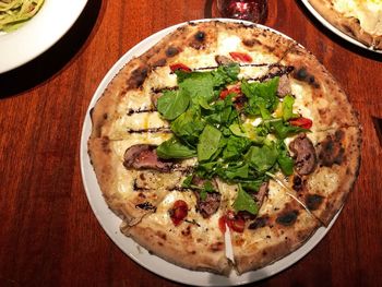 High angle view of pizza on table