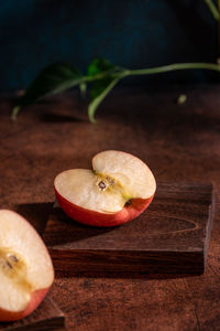 Close-up of apple on cutting board
