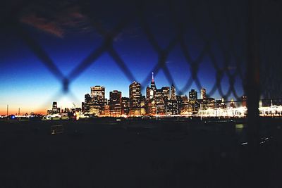 Illuminated cityscape at night