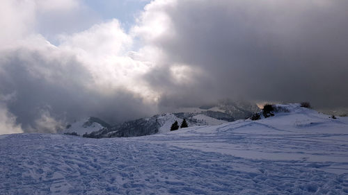 Snow covered mountain against sky
