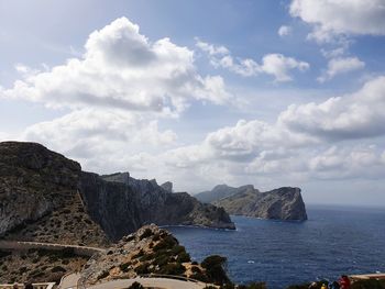 Scenic view of sea and rocks against sky