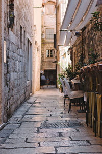 Alley amidst buildings in city